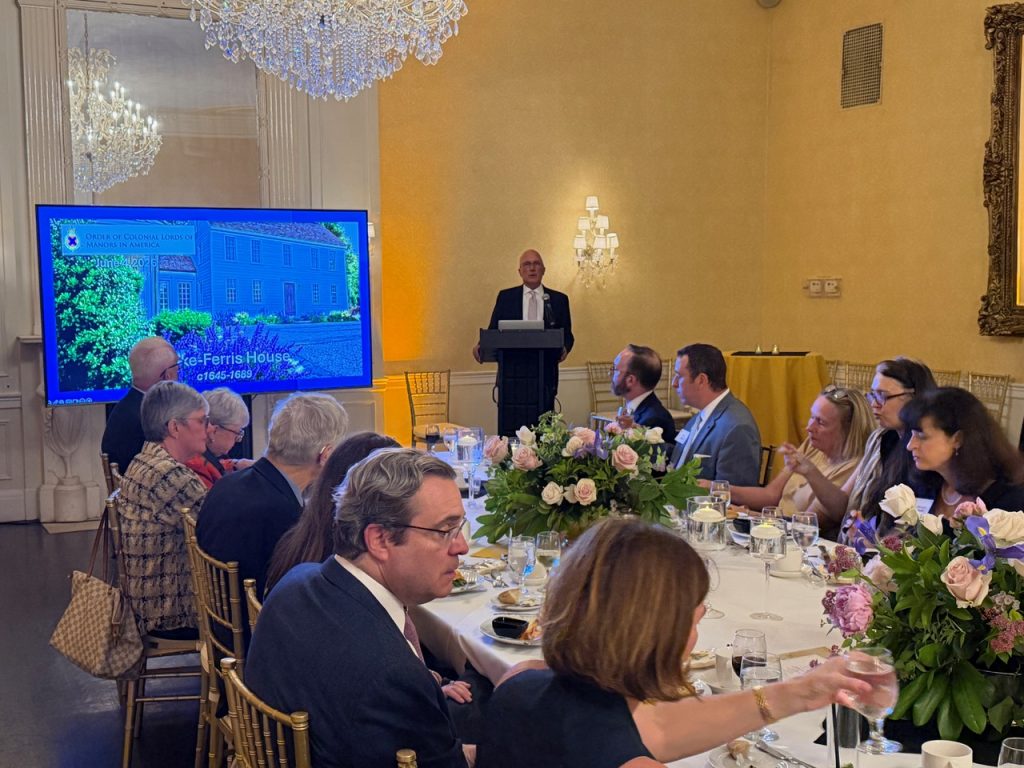 Chris Franco addresses the ticketed dinner after the reception